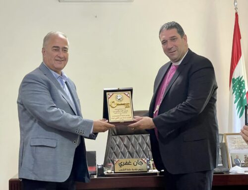Archbishop Hosam Naoum receives an award from the municipality of Alma el Chaab in Southern Lebanon, Tyre district.